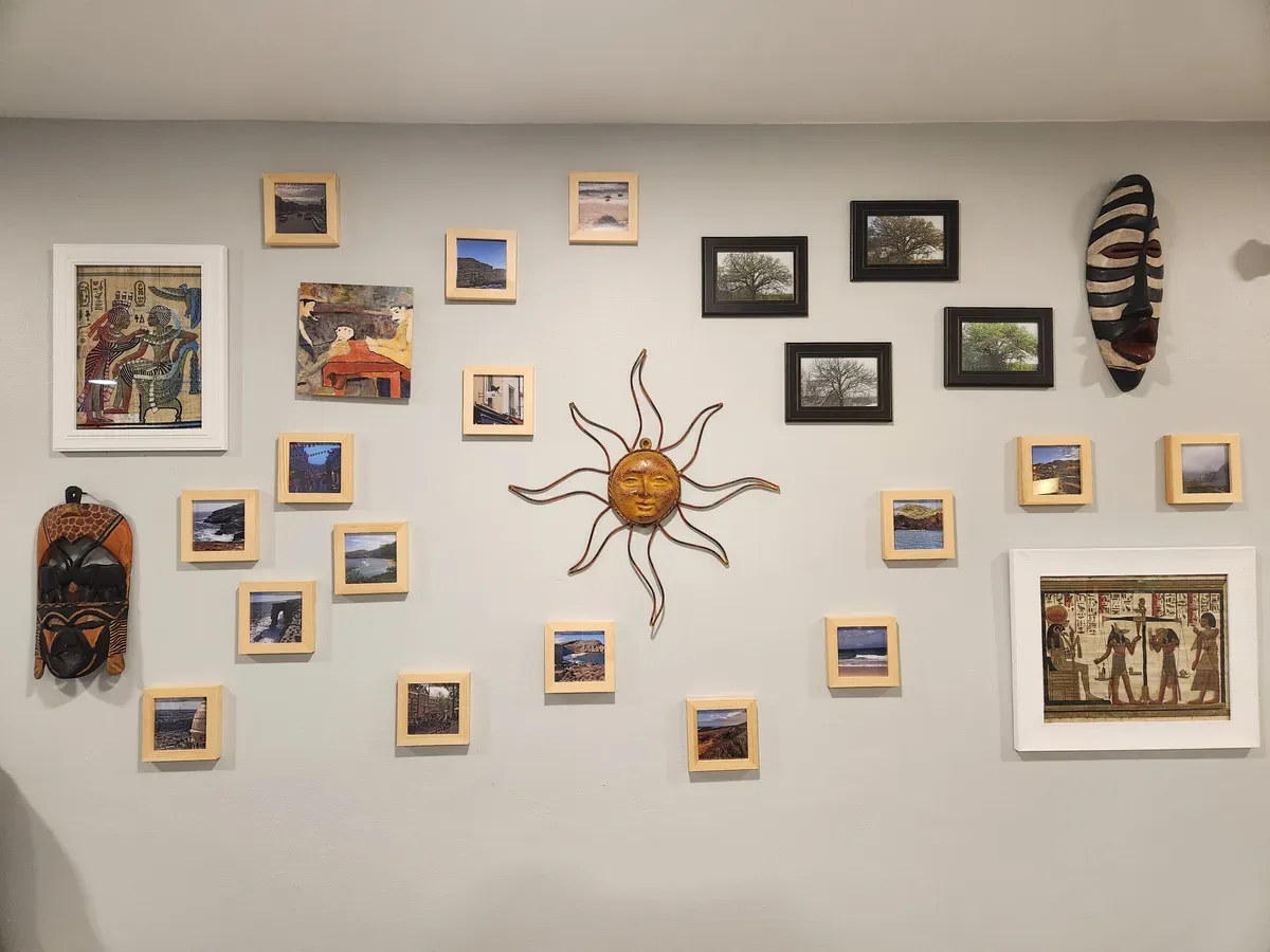 Gallery wall of framed pictures hung in a Milwaukee home